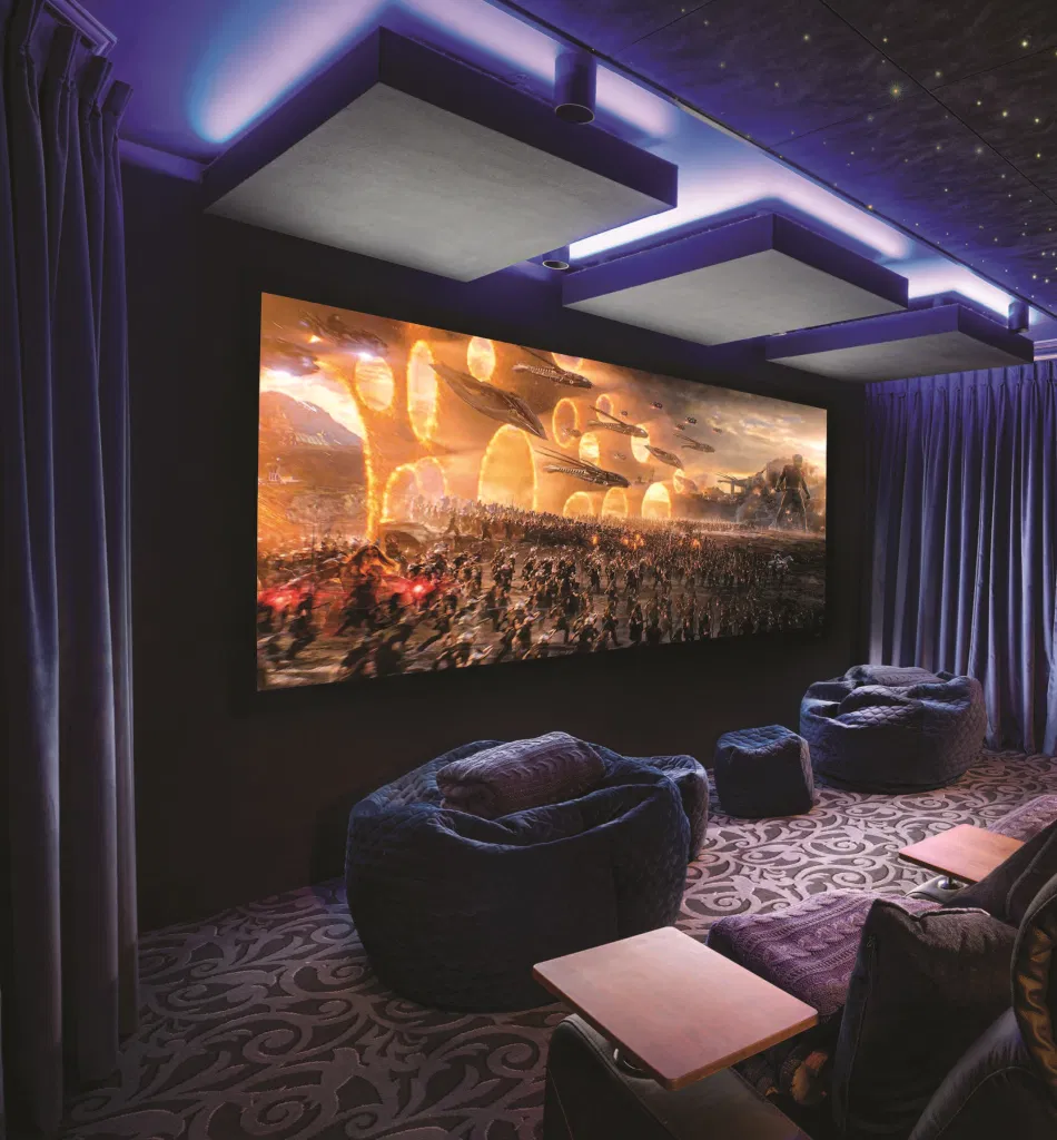 Wall treatment and finishes in a home theatre interior in Hyderabad